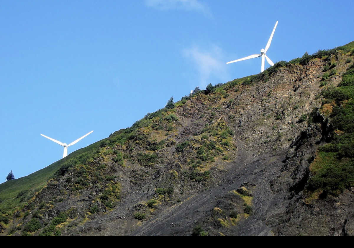 Two of the wind turbines in the Pillar Mountain Wind Farm in Kodiak, AK. To date, this faciity has saved more than 6.5 million gallons of diesel fuel.