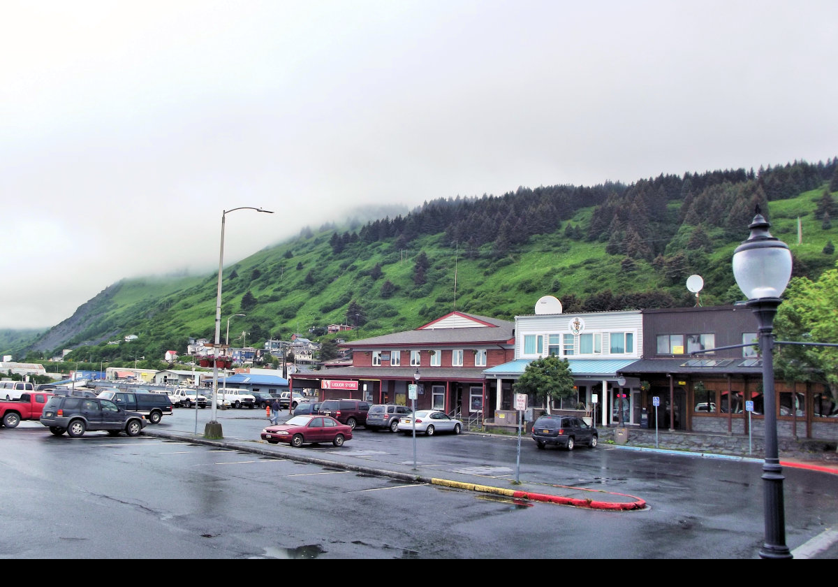 The shopping mall and car park in the rain.
