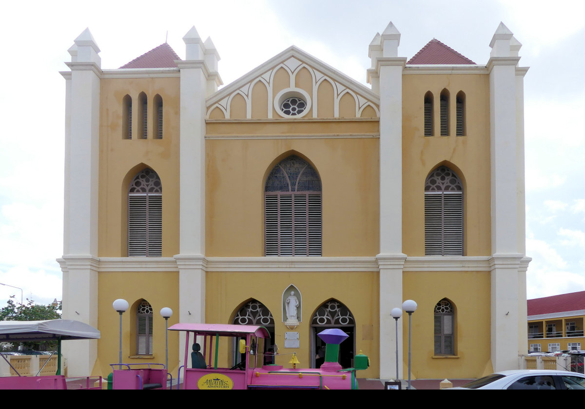 Queen of the Most Holy Rosary Cathedral in Willemstad, also known as Pietermaai Cathedral.  Built in 1870 with an ochre exterior and white trim, it is dedicated to the Virgin Mary and to Dr. José Gregorio Hernández.