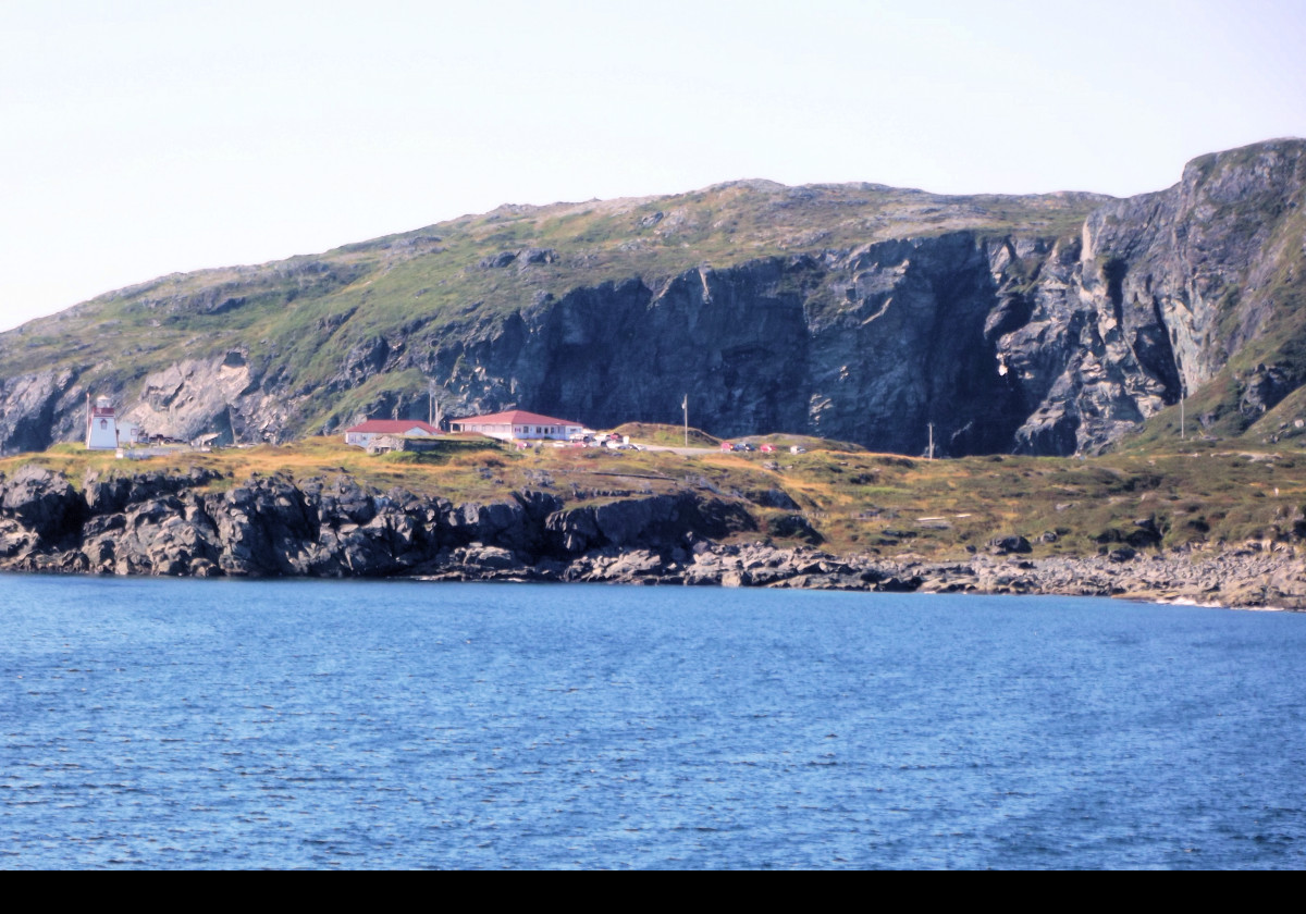 Constructed in 1912, the original lighthouse was a cylindrical iron tower with a balcony & acetylene gas lantern. A single-story building with a square tower replaced the iron tower in 1960, and was fitted with an electric light.