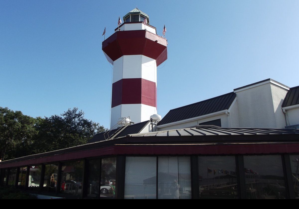 The lighthouse shows a white flashing light with a period of 2.5 seconds. It is visible for up to 24 km (15 miles)