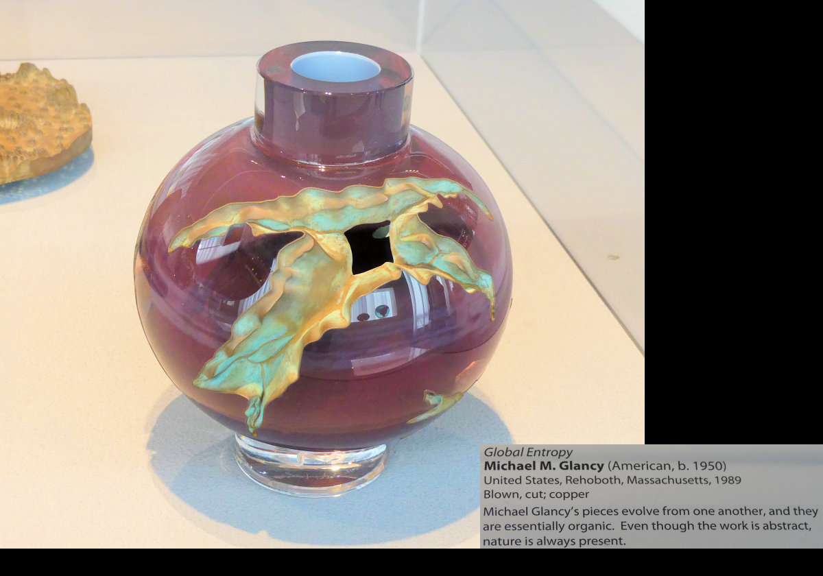 Made from blown and cut glass with copper by Michael M. Glancy in 1989.  He was born in rehoboth, Massachusetts in 1950.