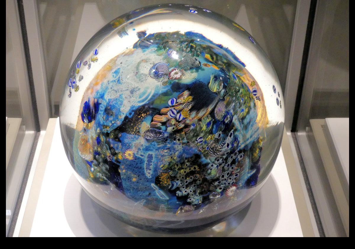 "Megaplanet" by Josh Simpson, 2006.  It was the 1,000th paperweight in the museum's collection, and weighs 100-pounds.