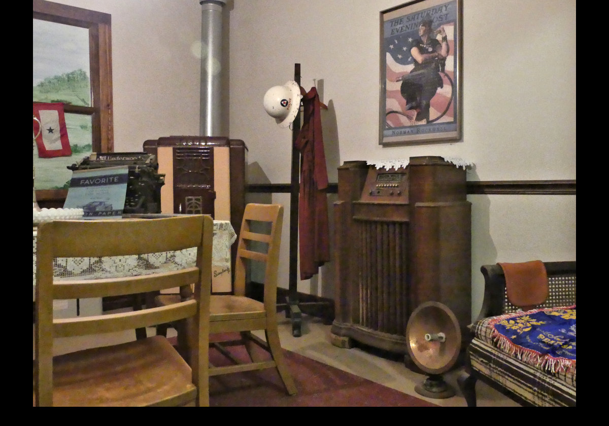 1940s style dining room. Classic radiant heater in the lower right.