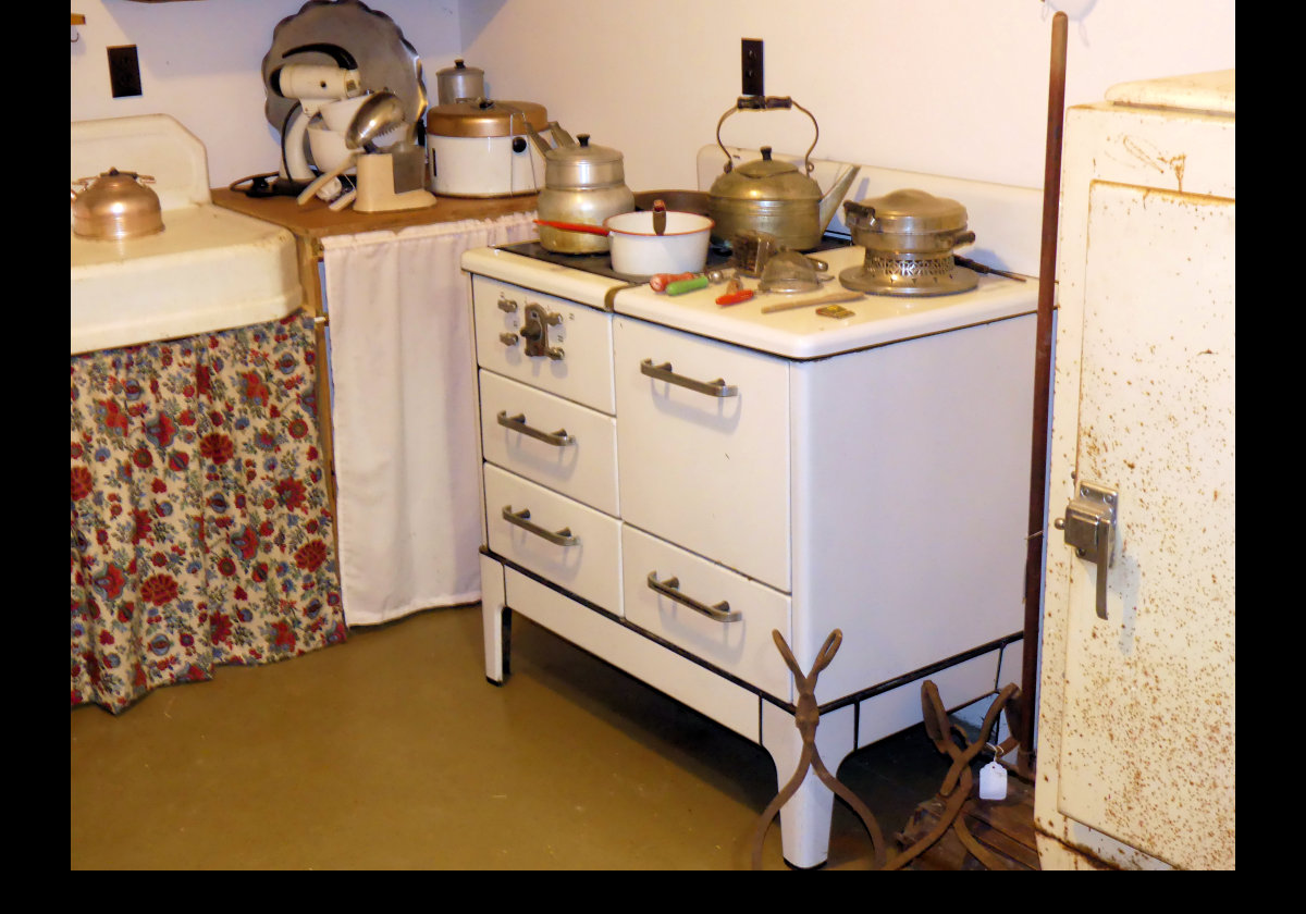 Refridgerators, rusty door on the edge of the picture to the right,were starting to becoe commonplace in the 1940s.