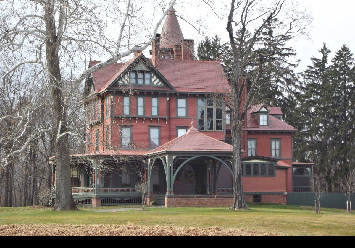Thomas’ son Robert Bowne Suckley & his wife, Elizabeth hired Arnout Cannon to enlarge the house in 1888. He added an additional floor making the house three stories with a five story circular tower. He also added an elaborate porte-cochere & verandah giving us the Queen Anne style house we see today.