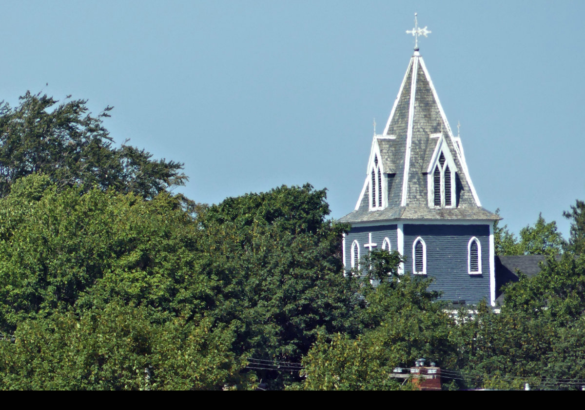 The steeple of St. Thomas’ Anglican Church.  It is a timber-framed church that was built in the Gothic Revival style in 1836.  It is the oldest church in the city of St. John’s.